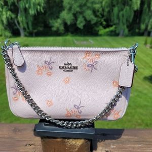 Coach Nolita 19 in light pink and silver hardware.
